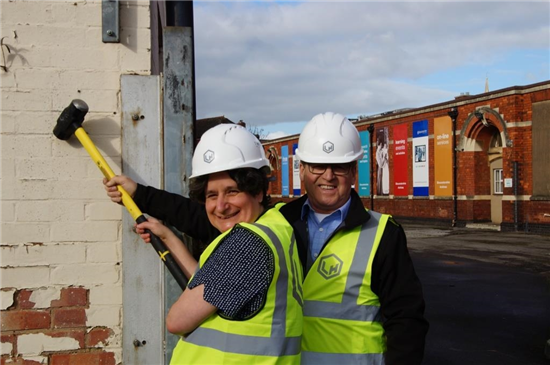 Heather Forbes and Paul Lander with sledgehammer